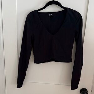 The Upside Deep Black Long Sleeve V-Neck cropped rashguard